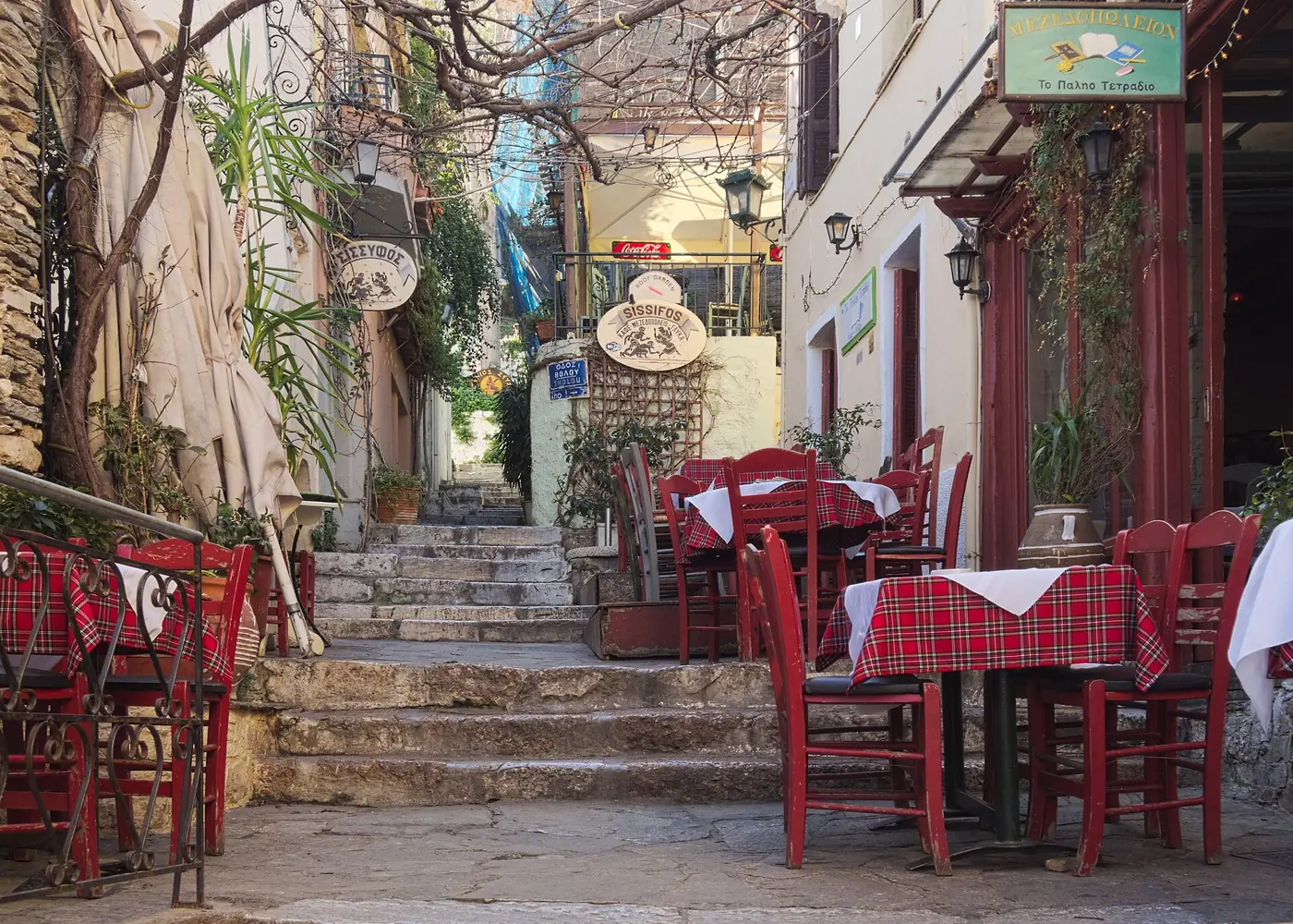 Restaurant tables on Mnisikleous Street, Plaka